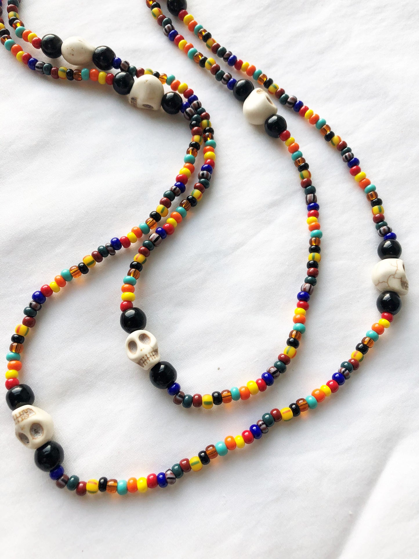 Ozain Eggun Beaded Necklace with Skulls